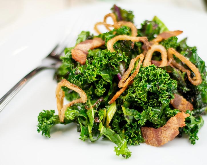Crispy Shallot Topped Greens with Warm Bacon Vinaigrette