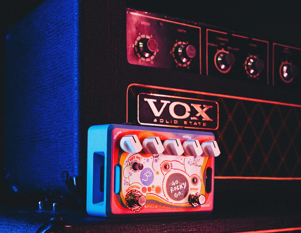 aclam guitars go rocky go pedal next to vox conqueror guitar amplifier