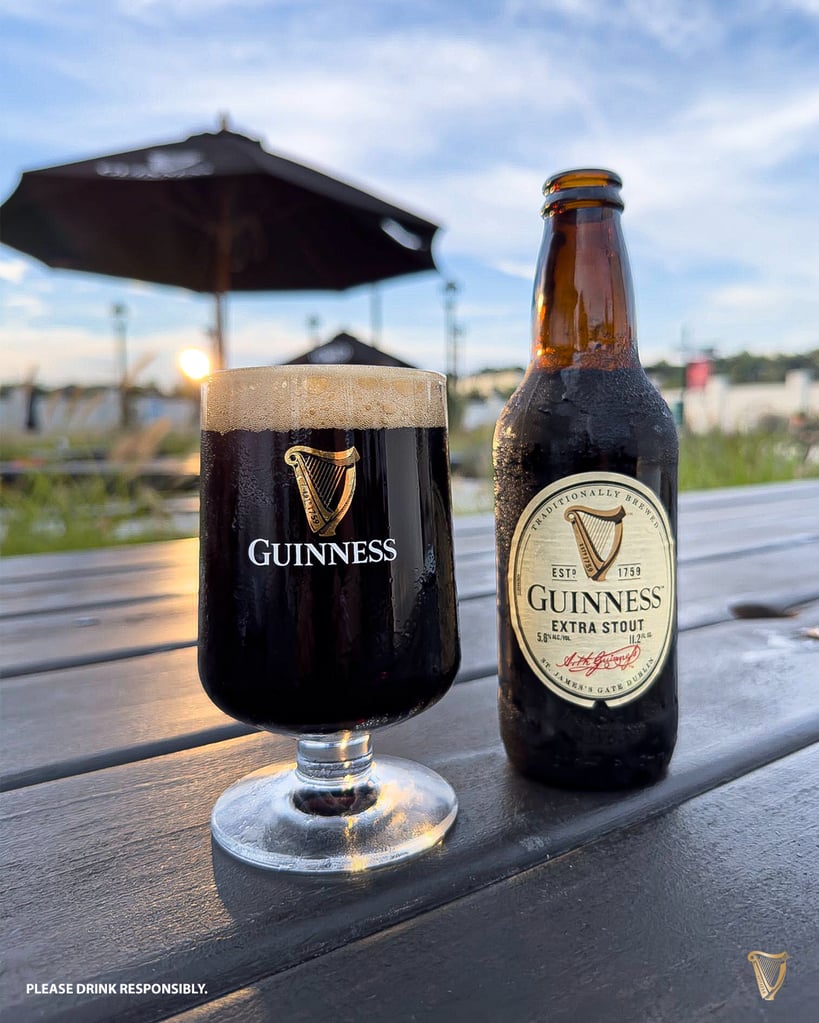 Guinness in goblet glass outside