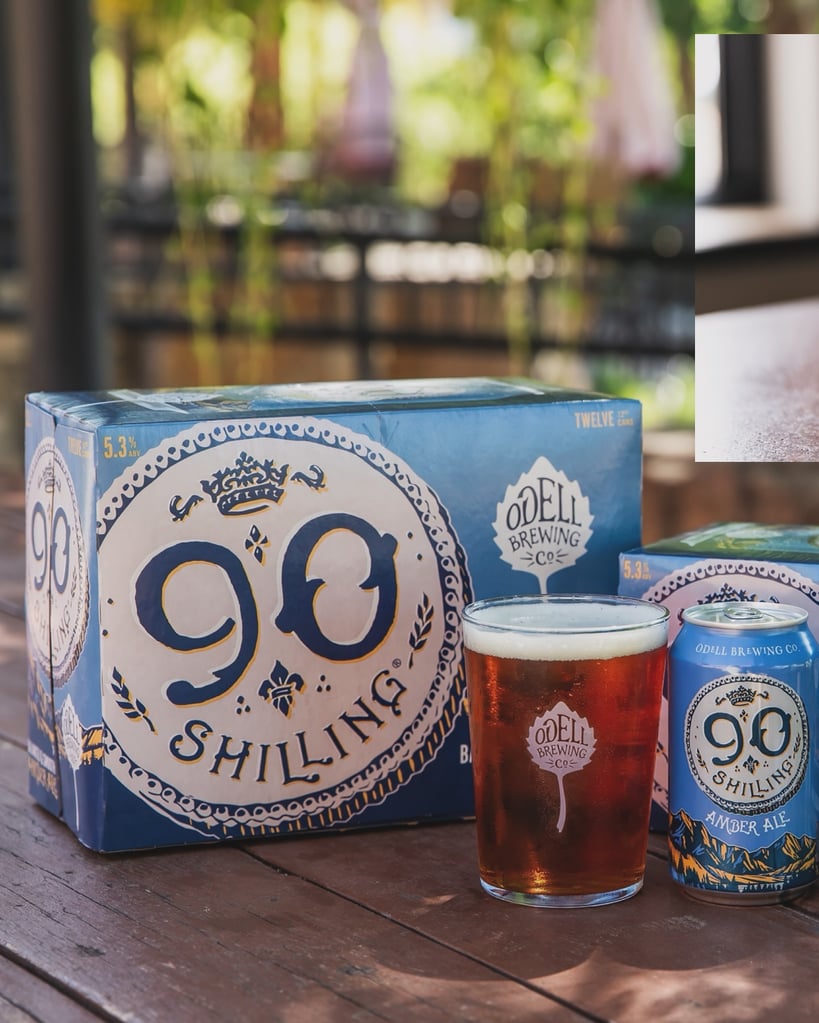 A six pack of cans of 90 Schilling from Odell Brewing